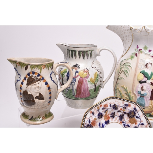 8 - A group of English ceramics, 19th century, comprising a large Staffordshire jug, depicting the murde... 