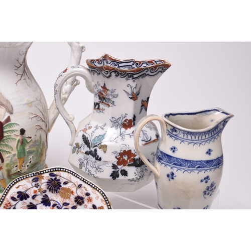 8 - A group of English ceramics, 19th century, comprising a large Staffordshire jug, depicting the murde... 