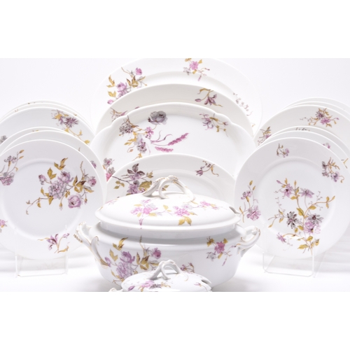 81 - A Limoges dinner service, circa 1888-1896, transfer-printed with an attractive predominantly pink fl... 