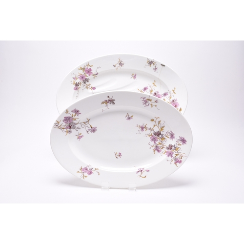 81 - A Limoges dinner service, circa 1888-1896, transfer-printed with an attractive predominantly pink fl... 