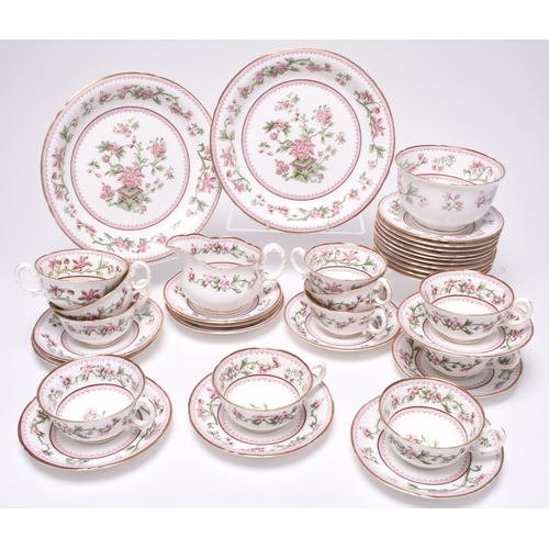 82 - A Royal Worcester tea service, dated 1931, transfer-printed with green and pink flowers, comprising ... 