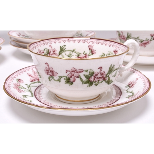 82 - A Royal Worcester tea service, dated 1931, transfer-printed with green and pink flowers, comprising ... 