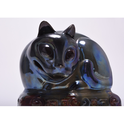 87 - A rare Mintons lustre cat, probably circa 1920s-30s, a night-light or pastille burner, similarly mod... 