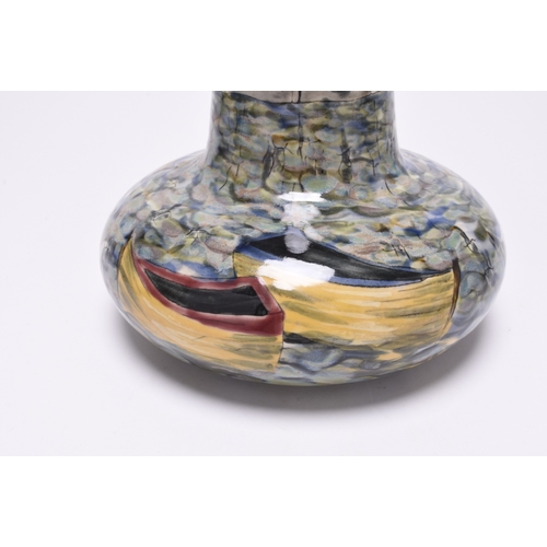 95 - A Cobridge stoneware vase, dated 2004, decorated with a landscape pattern of the Cornish harbour tow... 