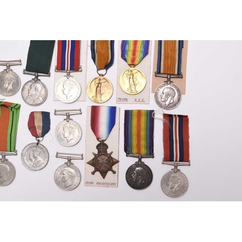 137 - A group of assorted medals, comprising three 1939-45 War Medals, two Defence Medals, a WW1 pair of 1... 