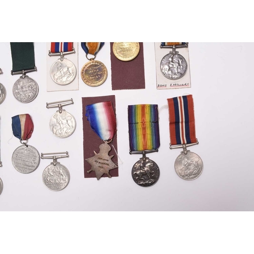 137 - A group of assorted medals, comprising three 1939-45 War Medals, two Defence Medals, a WW1 pair of 1... 