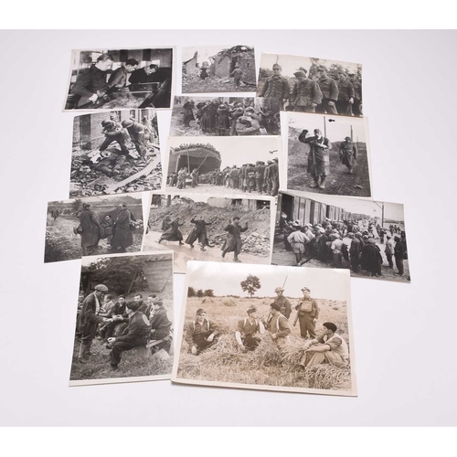 54 - PRESS PHOTOGRAPHY, Prisoners of War. Second World War, circa 1939-46. Approximately 71 black and whi... 