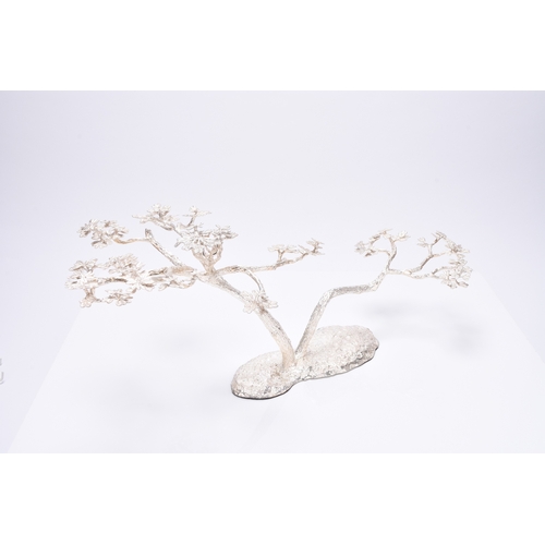 12 - A Patrick Mavros silver 'Fari' Acacia tree candle holder / table ornament, naturalistically cast as ... 