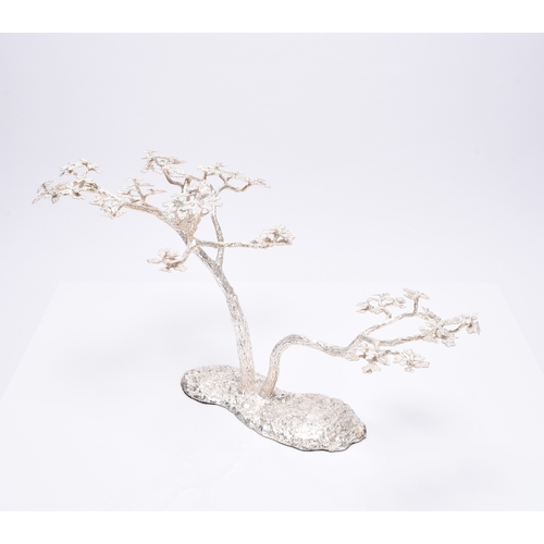 13 - A Patrick Mavros silver 'Fari' Acacia tree candle holder / table ornament, naturalistically cast as ... 