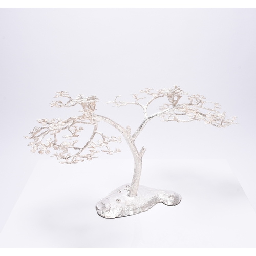 14 - A Patrick Mavros silver 'Fari' Acacia tree candle holder / table ornament, naturalistically cast as ... 