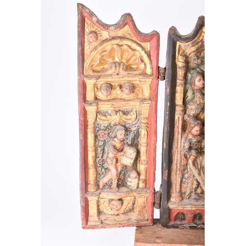 145 - A 17th century polychrome and parcel gilt gesso and carved wood triptych Portuguese or Spanish The c... 