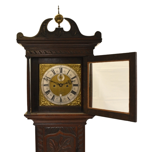 152 - An early 18th century later carved oak brass dial longcase clock The dial signed Samuel Watson, Lond... 