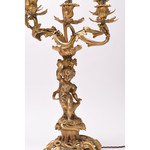 158 - A pair of ormolu rococo revival figural candelabra table lights 19th/20th century, the six branches ... 