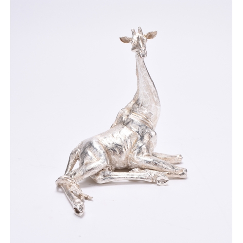 17 - A Patrick Mavros silver model of a giraffe, the sculpture modelled as a Giraffe sitting, stamped 'PM... 