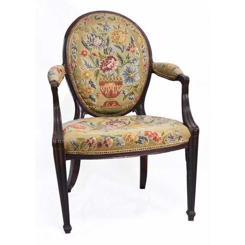 201 - A pair of Regency mahogany upholstered open armchairs The oval backs and padded arms over padded sea... 