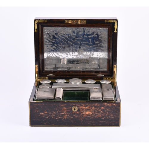 22 - An S Mordan Victorian silver mounted travelling dressing table set, the silver mounted by Henry Tipp... 