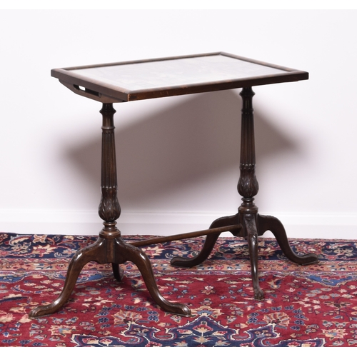 220 - A carved mahogany occasional table with tapestry inset tilt-top Raised on twin fluted tripod support... 