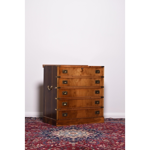 221 - A pair of reproduction yew wood campaign style secretaire chests The top secretaire drawer with fall... 