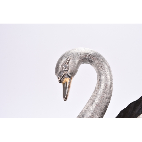 4 - An impressive Elizabeth II silver model of a swan, C J Vander, London 1975, the table centrepiece na... 