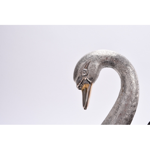 4 - An impressive Elizabeth II silver model of a swan, C J Vander, London 1975, the table centrepiece na... 