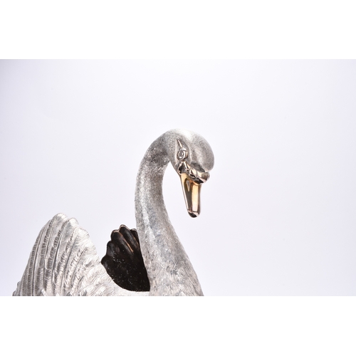 4 - An impressive Elizabeth II silver model of a swan, C J Vander, London 1975, the table centrepiece na... 