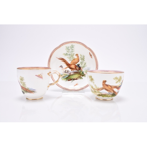 91 - A Coalport trio of coffee cup, teacup and saucer, circa 1860, with divided entwined handles, painted... 