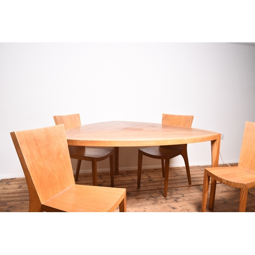 216 - Danilo Silvestrin for Gunther Lambert, a Milano range dining table and four chairs The table of tria... 