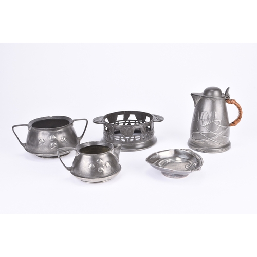 219 - An assembled group of Art Nouveau pewter Early 20th century, including a Tudric openwork dish or win... 