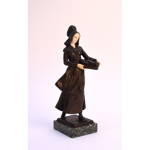 225 - After Meier, a bronze and ivory figure of a rustic maiden, early 20th century Modelled standing and ... 