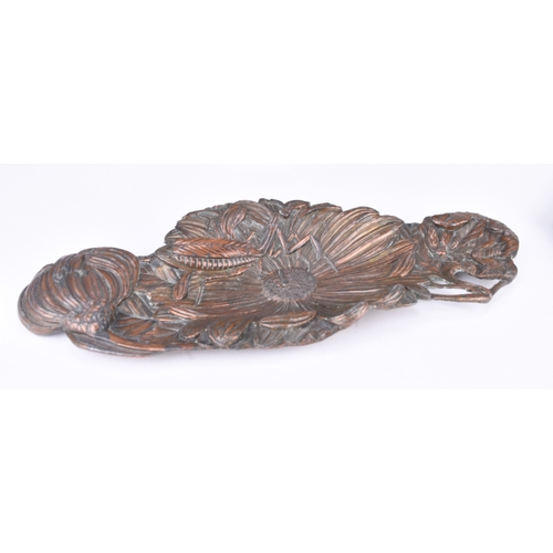 226 - An assembled group of Art Nouveau style pewter Including: A pair of octagonal dishes cast with maide... 