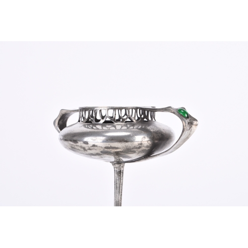 228 - An Imperial Zinn B&G inlaid pewter tazza The bowl of compressed onion form with twin angular handles... 