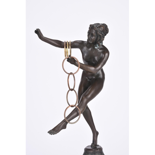 233 - After J.R. Colinet, an art deco style bronze figure of a hoop dancer On a domed marble base. 46cm hi... 