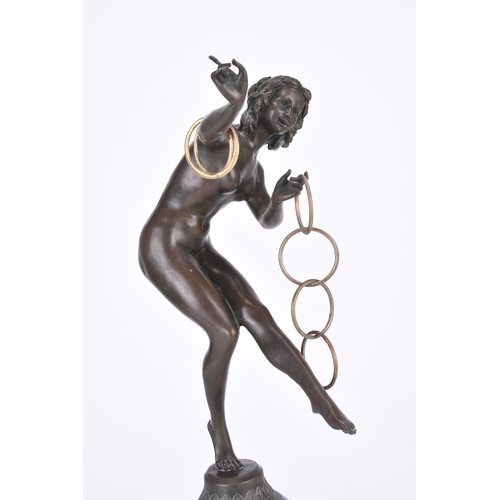 233 - After J.R. Colinet, an art deco style bronze figure of a hoop dancer On a domed marble base. 46cm hi... 