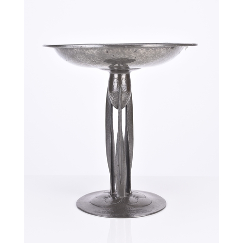 234 - Archibald Knox, a Tudric Liberty pewter tazza Model 01161, the shaped hammered bowl with 'honesty' b... 