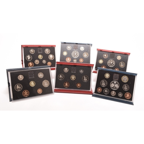 138 - Mahogany box Elizabeth II 17 silver proof coins Together with twenty five UK proof coin collections ... 