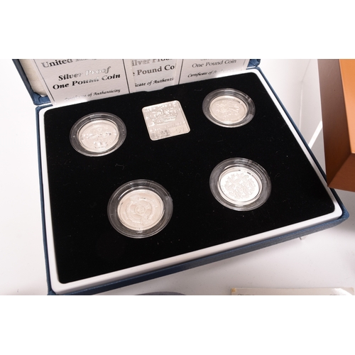 140 - A large UK commemorative collection comprising silver Piedfort crowns dated 2000. Silver Commonwealt... 