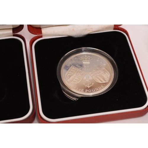 142 - UK commemorative coinage comprising fifteen boxes silver proof 50p - £1 - £2 and crown with certific... 