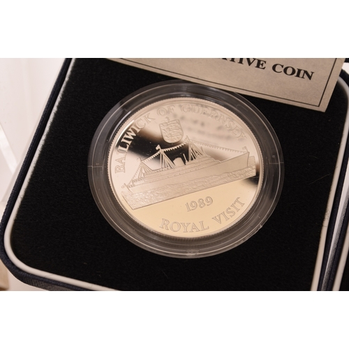 142 - UK commemorative coinage comprising fifteen boxes silver proof 50p - £1 - £2 and crown with certific... 