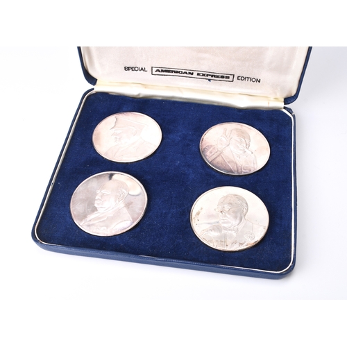 168 - A set of four silver 