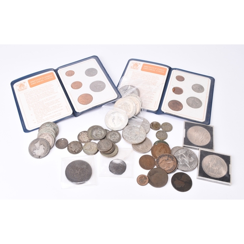 185 - A small accumulation of UK silver, cupro-nickel and bronze coinage comprising James I sixpence dated... 