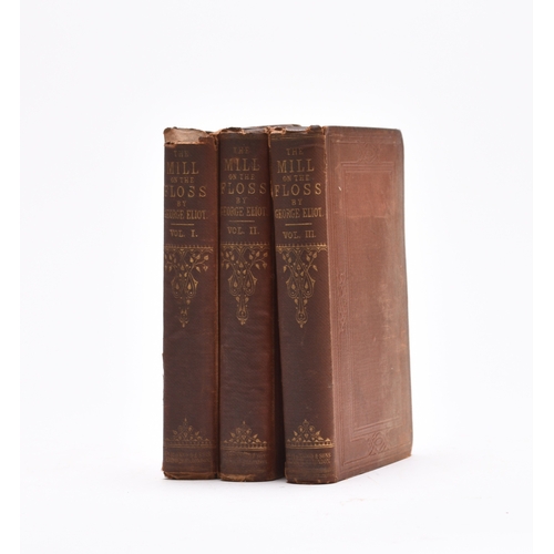 25 - ELLIOT, George, The Mill on the Floss. 3 vols, 1st edition 1860. Original cloth. Cloth damp marked o... 