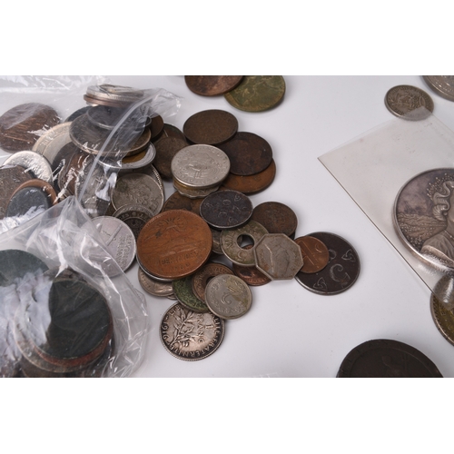 302 - A large collection of UK and foreign silver, cupro-nickel, copper and bronze coinage together with b... 