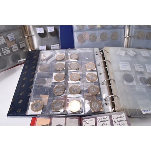 303 - Four albums of UK and foreign silver, cupro-nickel, copper and bronze coinage (Approximately 300 coi... 