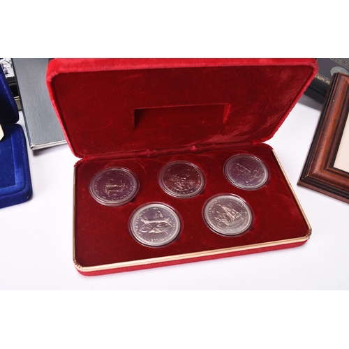 304 - A large accumulation of United Kingdom and foreign coinage and commemorative coinage. Within boxes a... 