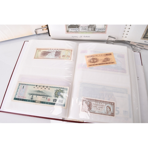 305 - Three albums of UK and foreign banknotes together with seven framed banknotes to include Bank of Eng... 