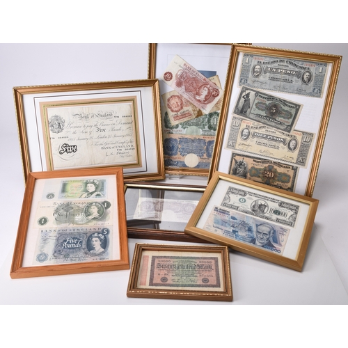 305 - Three albums of UK and foreign banknotes together with seven framed banknotes to include Bank of Eng... 