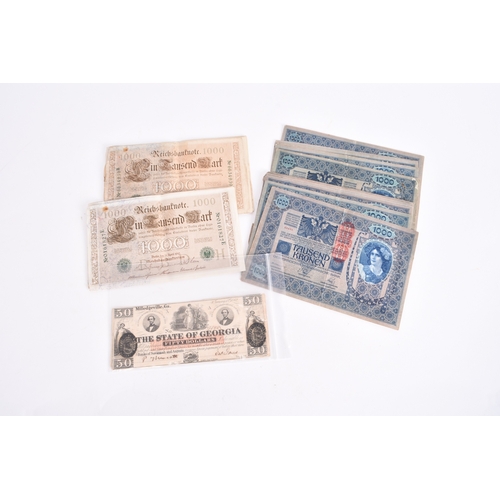 361 - Stamps, share certificates and bank notes; an accumulation of stamps on and off paper in packets plu... 