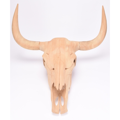 111 - A contemporary carved beech wood longhorn steer skull Life size. 66cm wide x 59cm long