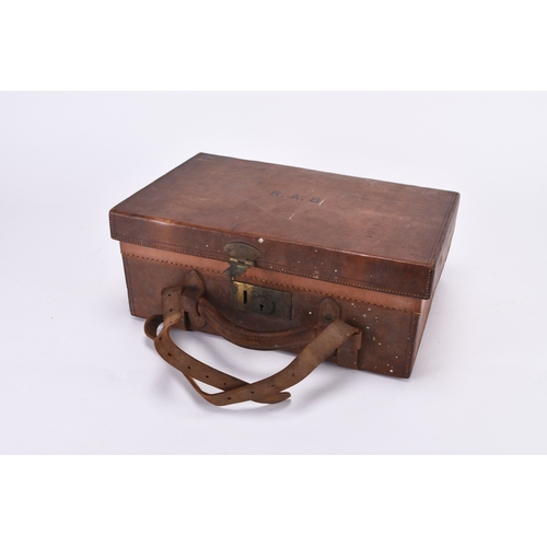 17 - An Army & Navy leather ammunition case With Secure Lever brass lock, interior fitted with dividers a... 