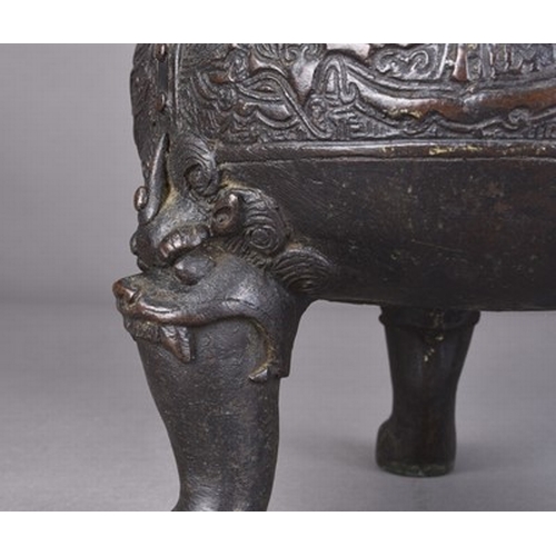 107 - A Chinese bronze censer, possibly Ming Dynasty Thickly cast with a pair of curving strap handles ris... 